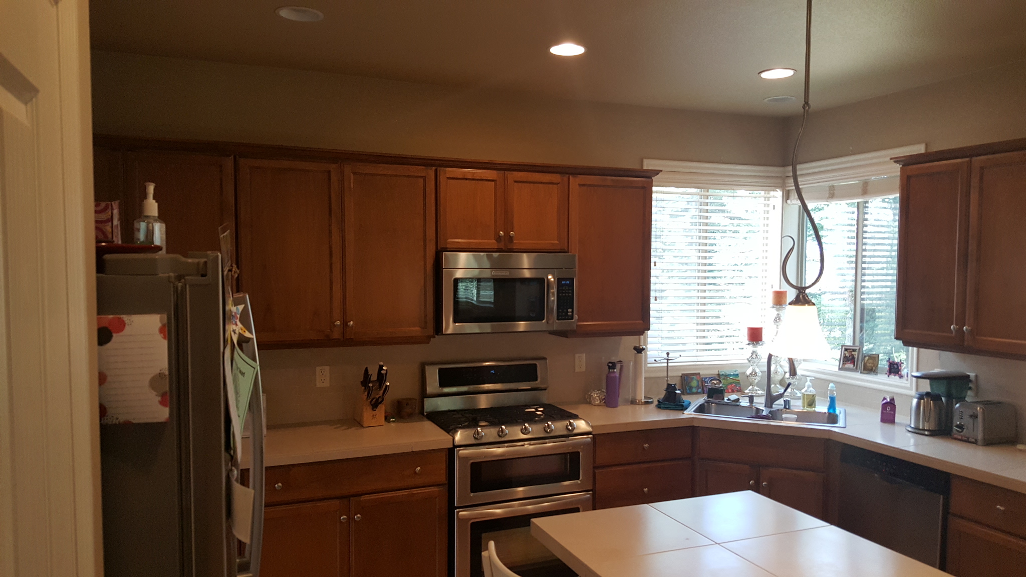 White Kitchen  with Bold Blue  Backsplash Kashas Design Build 